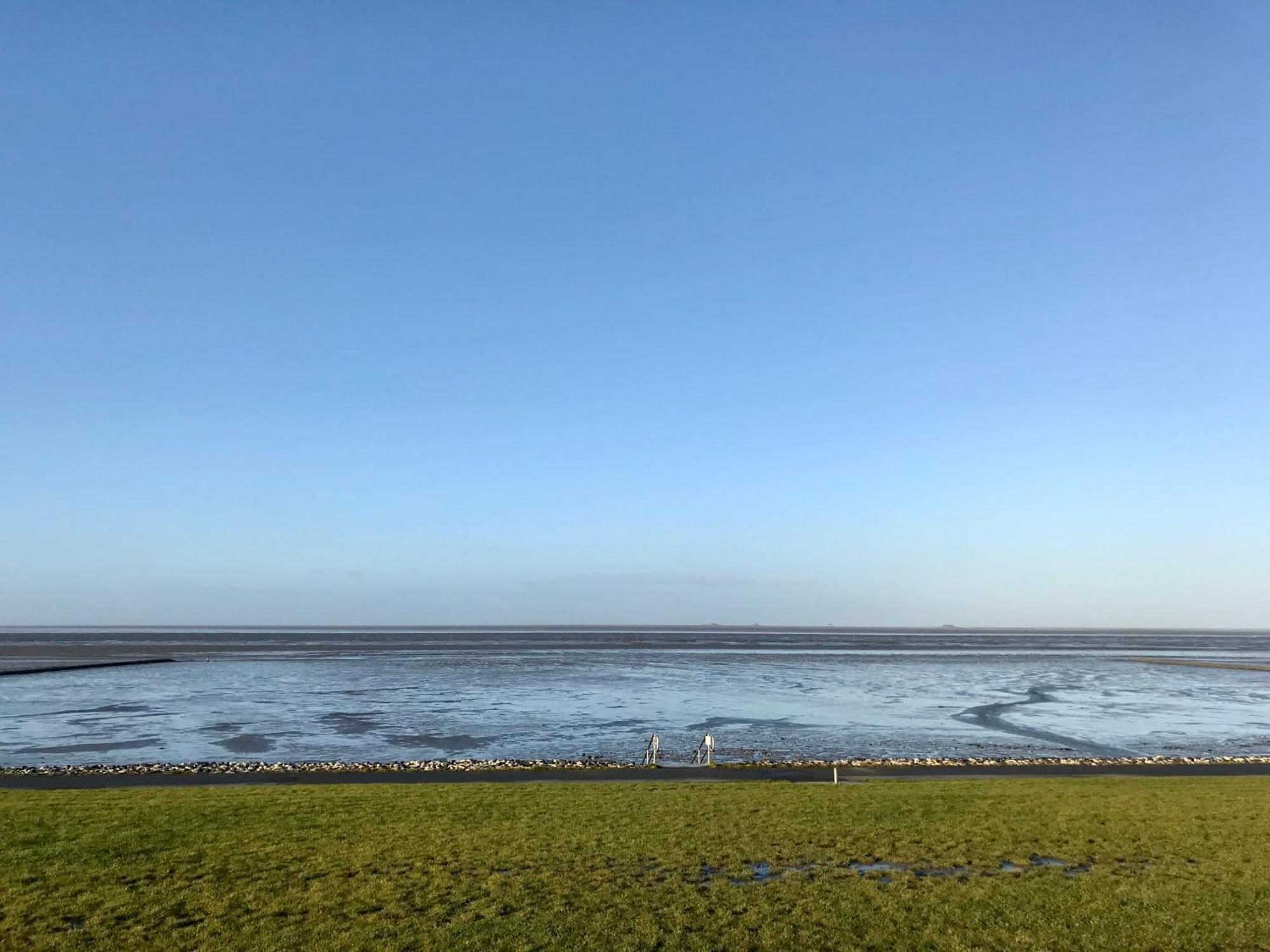 Gemütliches Ferienhaus hinterm Deich Nordstrand Exterior foto